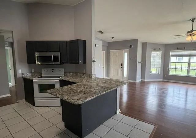 3rd image of 158 Eagle Point Blvd, Auburndale, FL 33823 | MLS# O6429611