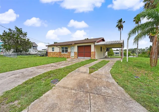 Photo 3 of Single family home for sale at 4093 Flamingo Blvd, Hernando Beach, FL 34607 | MLS# TB8534579 | Listing updated on 2026-09-02