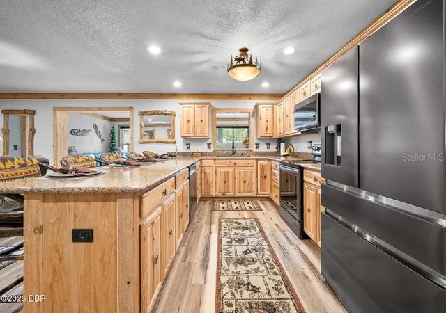 Photo 4 of Single family home for sale at 120 Peachtree Cir, Daytona Beach, FL 32114 | MLS# V4950492 | Listing updated on 2026-08-22