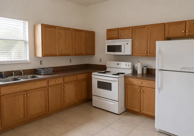 Photo 3 of Multi family home for sale at 1440 Prescott St S, Saint Petersburg, FL 33712 | MLS# TB8534682 | Listing updated on 2026-08-20