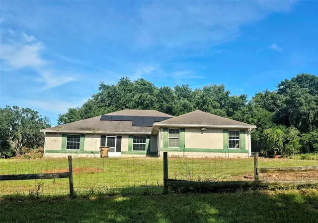 1st image of 310 Tomato Hill Rd, Leesburg, FL 34748 | MLS# OM729601