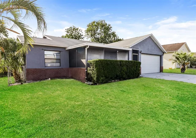 Photo 2 of Single family home for sale at 11322 Wolf Ct, Port Richey, FL 34668 | MLS# O6429960 | Listing updated on 2026-09-02