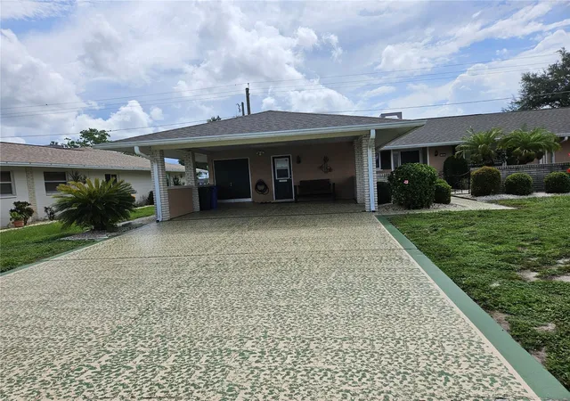 Photo 2 of Single family home for sale at 1505 N Pebble Beach Blvd, Sun City Center, FL 33573 | MLS# TB8535039 | Listing updated on 2026-08-24