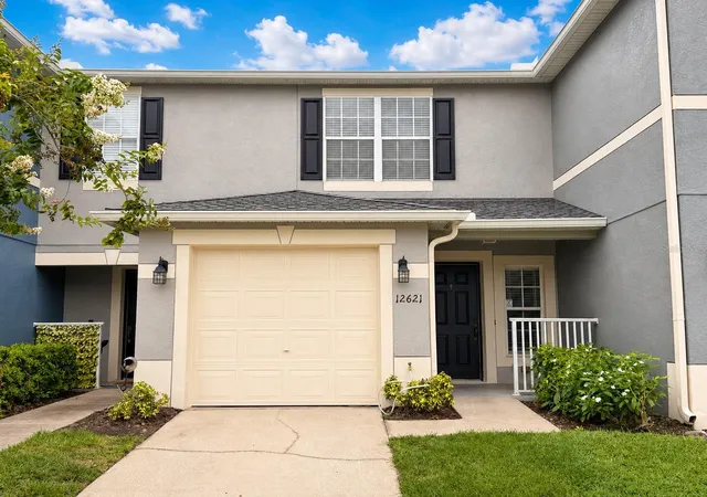 Photo 1 of Townhouse for sale at 12621 Somerset Oaks St, Orlando, FL 32828 | MLS# O6430066 | Listing updated on 2026-10-10