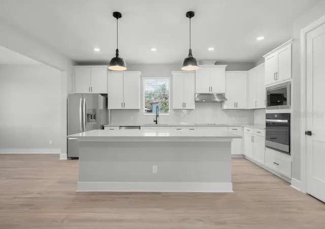 5th image of 3849 Saddle Hill Trl, Fruitland Park, FL 34731 | MLS# TB8535325