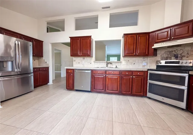 2nd image of 944 Nw 87th Dr, Gainesville, FL 32606 | MLS# O6430354