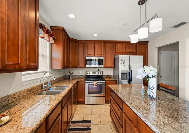 Photo 3 of Single family home for sale at 1922 Matthew Ct, Lakeland, FL 33813 | MLS# O6430374 | Listing updated on 2026-09-01