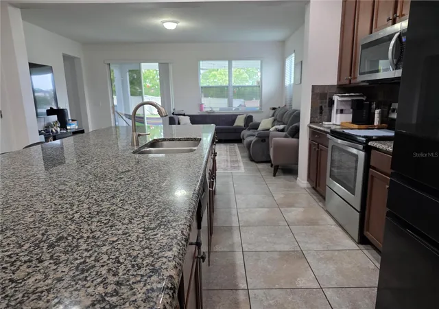 Photo 3 of Single family home for sale at 12749 Garridan Ave, Windermere, FL 34786 | MLS# O6430484 | Listing updated on 2026-08-19