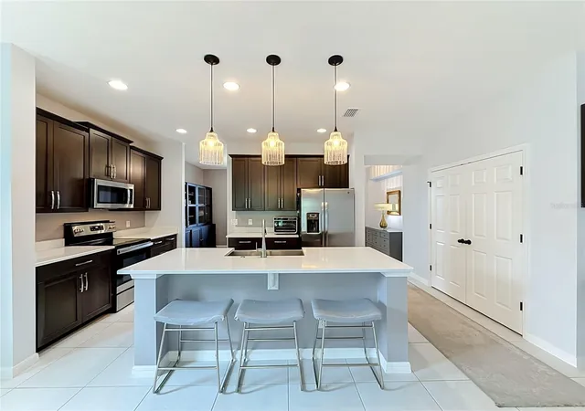 4th image of 5516 Windsong Oak Dr, Leesburg, FL 34748 | MLS# O6430490