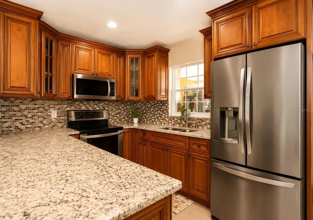 Photo 3 of Single family home for sale at 4409 W Hanna Ave, Tampa, FL 33614 | MLS# TB8535620 | Listing updated on 2026-09-30