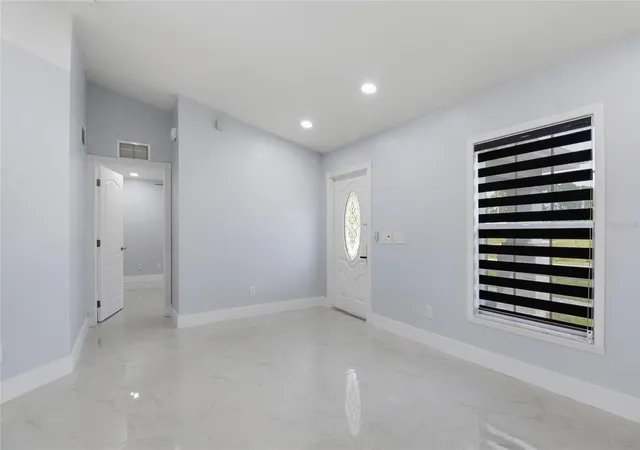 Photo 4 of Single family home for sale at 1104 Morton St E, Lehigh Acres, FL 33974 | MLS# TB8535887 | Listing updated on 2026-09-05