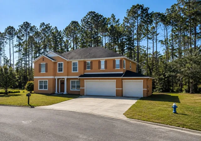 1st image of 70 Rollins Ln, Palm Coast, FL 32164 | MLS# O6430892