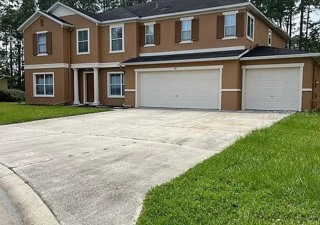 20th image of 70 Rollins Ln, Palm Coast, FL 32164 | MLS# O6430892