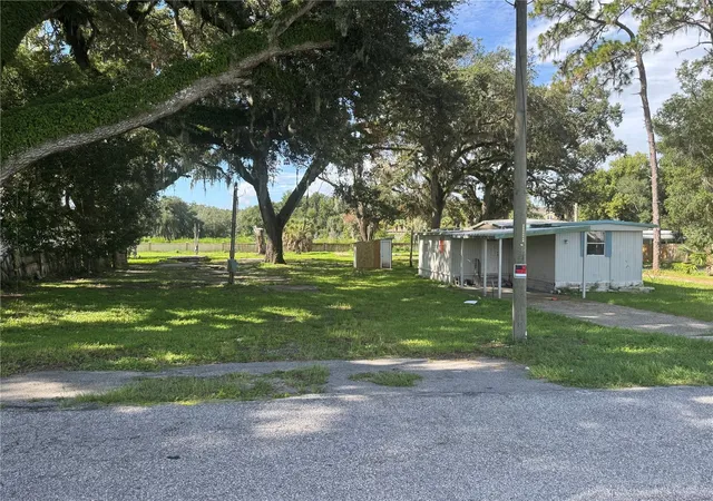 2nd image of 6946 Sylvan Ln, Zephyrhills, FL 33541 | MLS# TB8536081