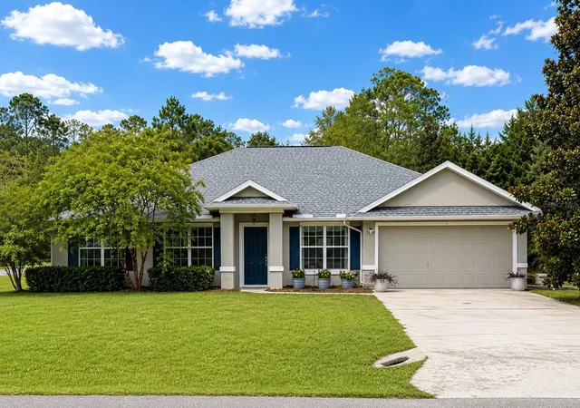 1st image of 1 Sleeping Beauty Pl, Palm Coast, FL 32164 | MLS# FC320472