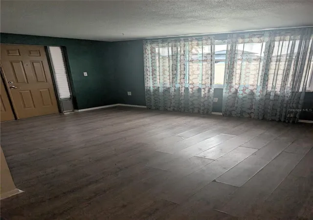 Photo 2 of Single family home for sale at 9436 Glen Moor Ln, Port Richey, FL 34668 | MLS# TB8536227 | Listing updated on 2026-09-28