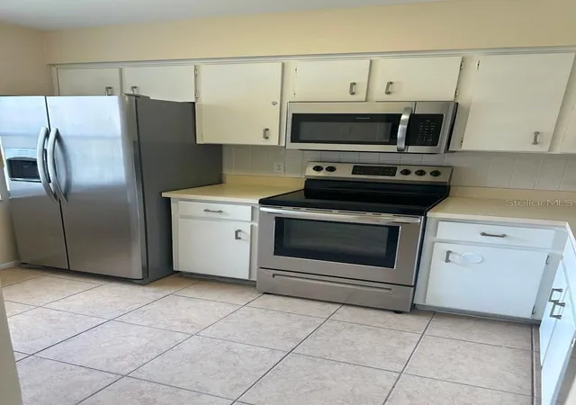 Listing Photo 5 - Condo for sale in building located at 3245 Candle Ridge Dr, Orlando, FL 32822 - Unit #203