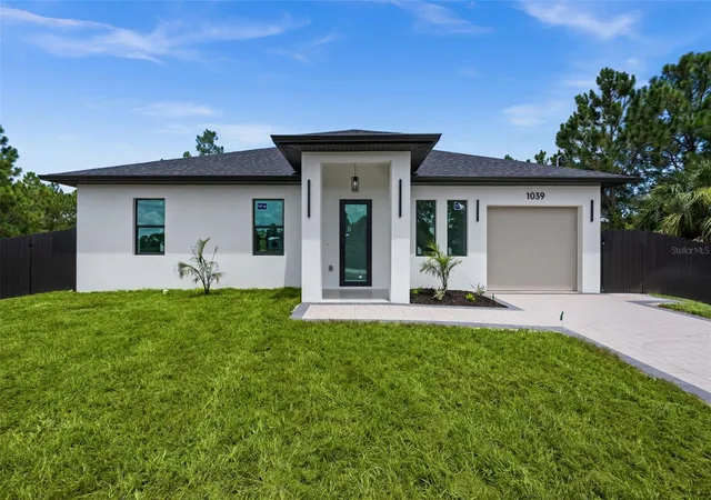 Photo 1 of Single family home for sale at 1039 Bassinger Ave S, Lehigh Acres, FL 33974 | MLS# TB8536542 | Listing updated on 2026-08-17