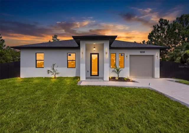 Photo 2 of Single family home for sale at 1039 Bassinger Ave S, Lehigh Acres, FL 33974 | MLS# TB8536542 | Listing updated on 2026-08-17
