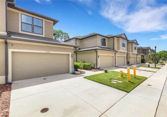 Photo 3 of Townhouse for sale at 5166 Bay Isle Cir, Clearwater, FL 33760 | MLS# TB8536617 | Listing updated on 2026-09-23