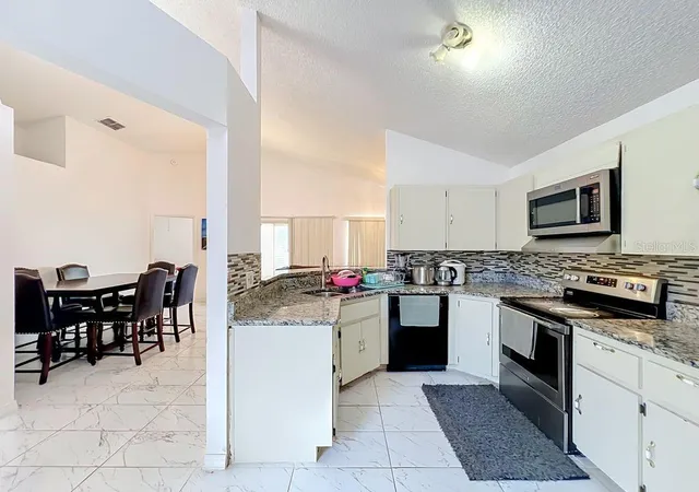 3rd image of 3549 Spring Land Dr, Orlando, FL 32818 | MLS# O6431585