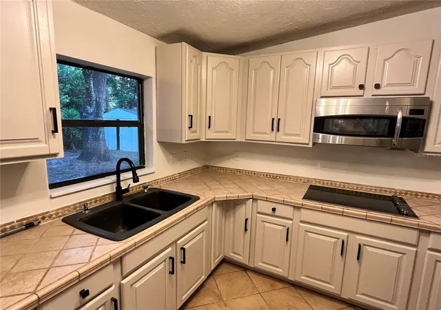 4th image of 6610 Bywood Dr, Orlando, FL 32810 | MLS# O6431719