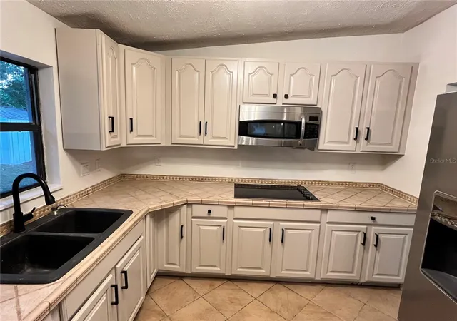 5th image of 6610 Bywood Dr, Orlando, FL 32810 | MLS# O6431719