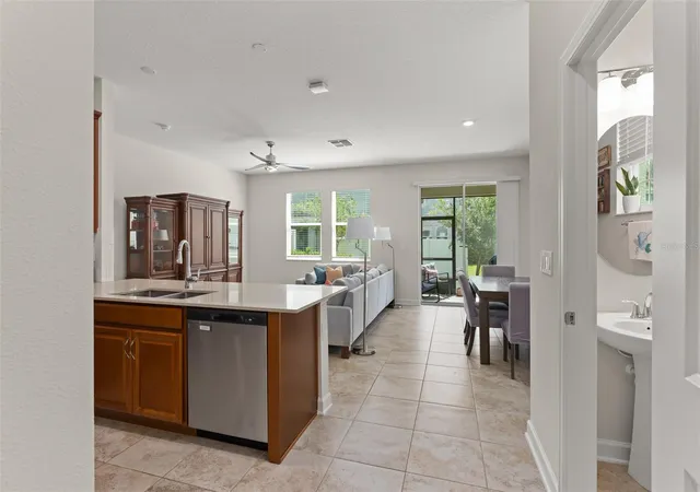 Photo 3 of Townhouse for sale at 12055 Scrub Palm Ln, Orlando, FL 32824 | MLS# O6431806 | Listing updated on 2026-08-26