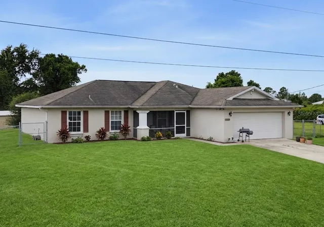 3rd image of 3109 64Th St W, Lehigh Acres, FL 33971 | MLS# TB8536970