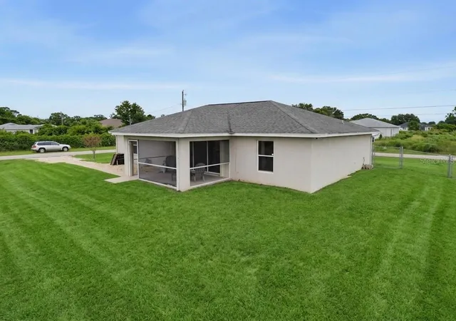 4th image of 3109 64Th St W, Lehigh Acres, FL 33971 | MLS# TB8536970