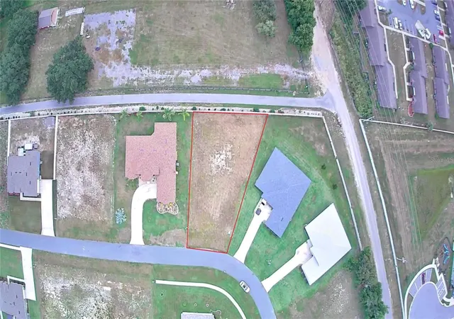 1st image of 817 Oaks Shores Rd, Leesburg, FL 34748 | MLS# O6432051