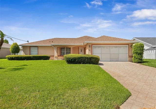 1st image of 52 Fenwick Ln, Palm Coast, FL 32137 | MLS# FC320552
