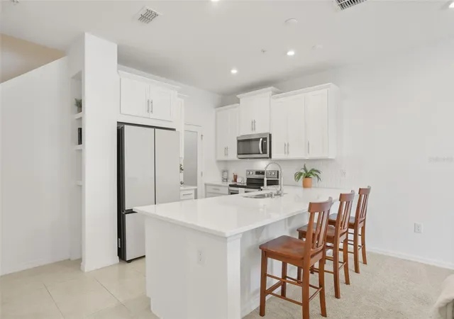 Photo 3 of Townhouse for sale at 10245 Highline Crst St, Orlando, FL 32832 | MLS# O6432078 | Listing updated on 2026-09-04