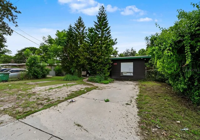 Photo 3 of Single family home for sale at 1803 E Bougainvillea Ave, Tampa, FL 33612 | MLS# TB8537369 | Listing updated on 2026-08-24