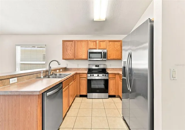 Photo 4 of Single family home for sale at 1174 Beech Grv Way, Orlando, FL 32828 | MLS# O6432235 | Listing updated on 2026-08-26