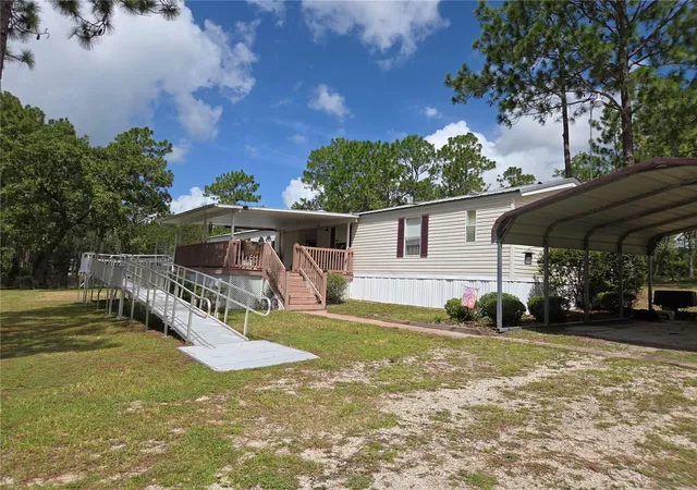 2nd image of 750 Ne 131st Ter, Williston, FL 32696 | MLS# OM730111