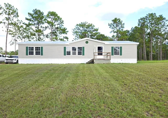1st image of 13030 Se 21st Pl, Morriston, FL 32668 | MLS# OM730170