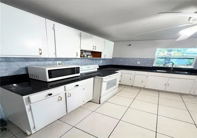 Photo 3 of Single family home for sale at 8904 N 20th Street, Tampa, FL 33604 | MLS# TB8537911 | Listing updated on 2026-10-08