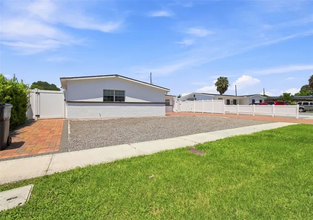Photo 3 of Single family home for sale at 6033 Ambassador Dr, Tampa, FL 33615 | MLS# TB8537925 | Listing updated on 2026-08-28