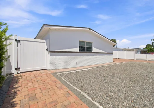 Photo 4 of Single family home for sale at 6033 Ambassador Dr, Tampa, FL 33615 | MLS# TB8537925 | Listing updated on 2026-08-28