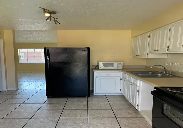 4th image of 1627 W Oak Ridge Rd #D, Orlando, FL 32809 | MLS# O6432762