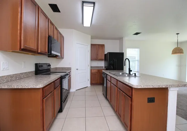 Photo 3 of Single family home for sale at 3238 Byp Bay Dr, Lakeland, FL 33811 | MLS# O6432774 | Listing updated on 2026-09-21