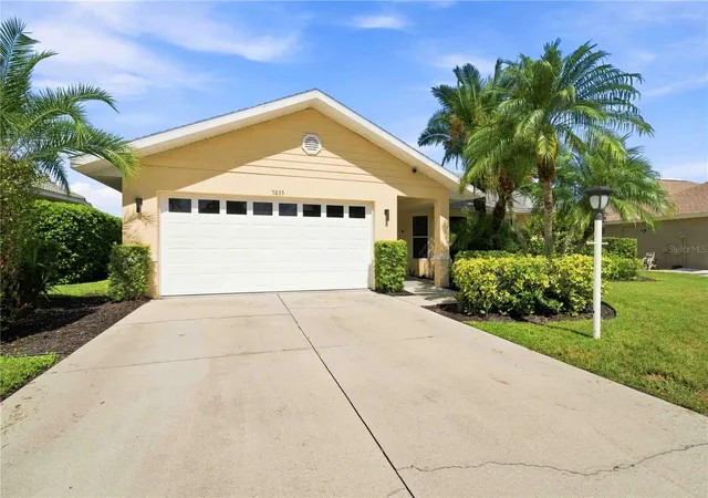 Photo 3 of Single family home for sale at 5833 Carriage Dr, Sarasota, FL 34243 | MLS# A4702760 | Listing updated on 2026-08-27