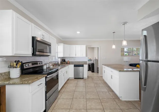 Photo 4 of Single family home for sale at 6410 Walton Way, Tampa, FL 33610 | MLS# TB8538217 | Listing updated on 2026-10-04