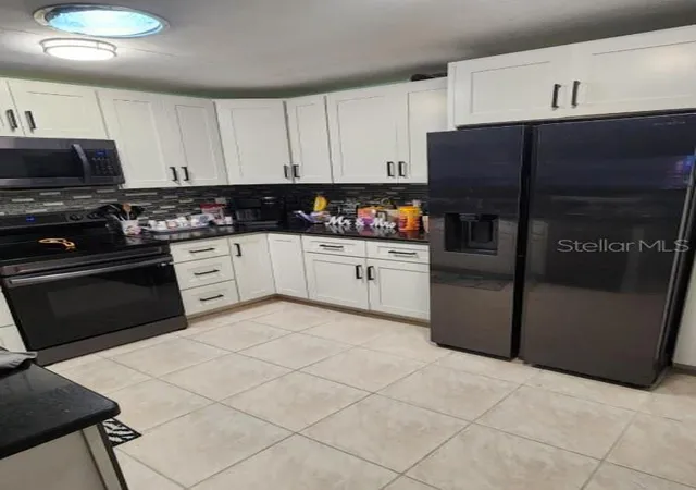 4th image of 5573 Foxlake Dr, North Fort Myers, FL 33917 | MLS# TB8538224