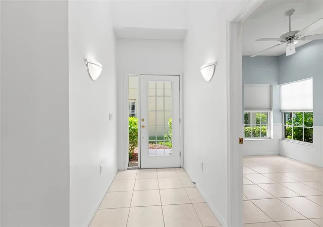4th image of 11117 Kapok Grand Cir, Saint Petersburg, FL 33708 | MLS# TB8538542