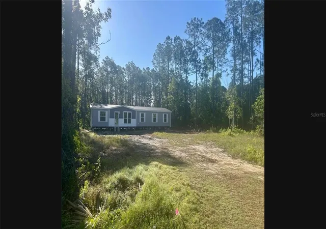 1st image of 1636 Mistletoe St, Bunnell, FL 32110 | MLS# O6433395