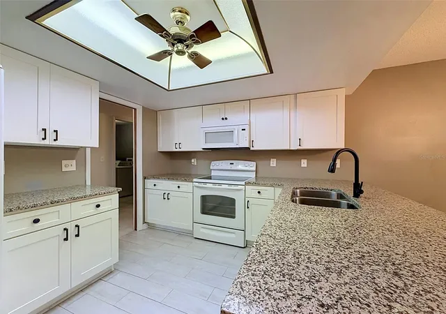Photo 2 of Single family home for sale at 7308 Baltusrol Dr, New Port Richey, FL 34654 | MLS# W7888585 | Listing updated on 2026-09-01