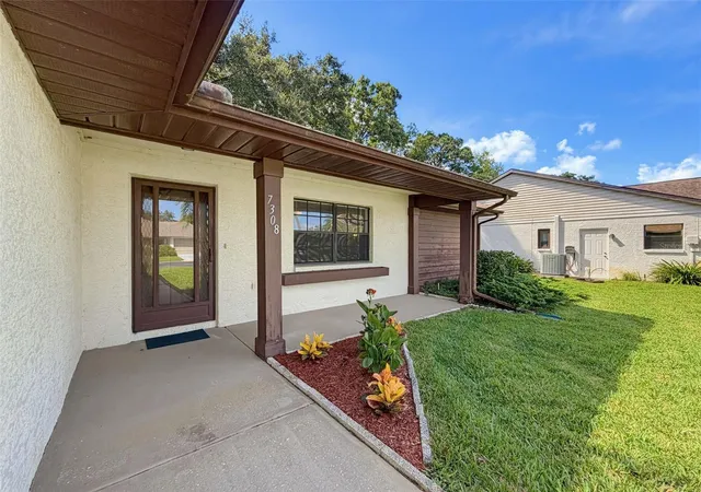 Photo 5 of Single family home for sale at 7308 Baltusrol Dr, New Port Richey, FL 34654 | MLS# W7888585 | Listing updated on 2026-09-01