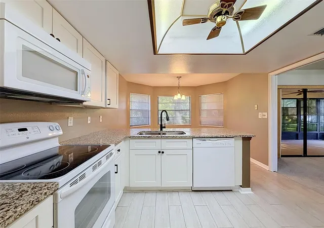Photo 3 of Single family home for sale at 7308 Baltusrol Dr, New Port Richey, FL 34654 | MLS# W7888585 | Listing updated on 2026-10-14